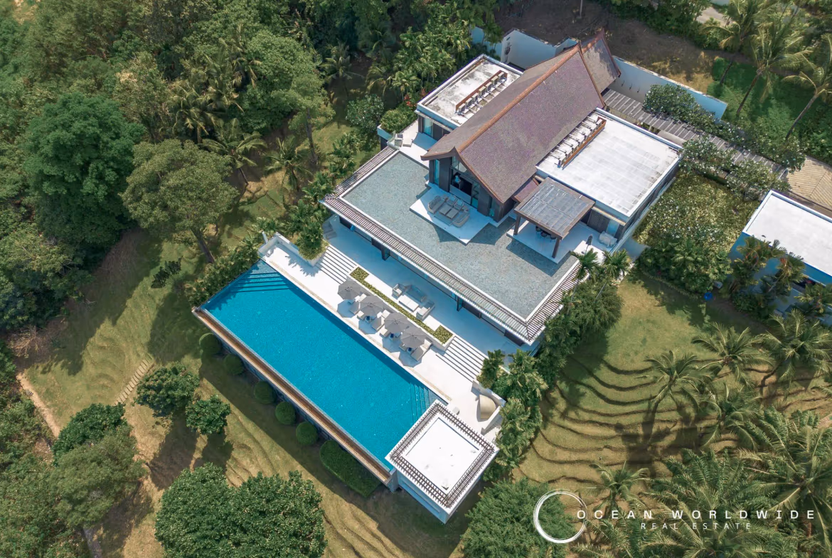 A 6-bedroom villa in Cape Yamu features a large private pool and faces a body of water.