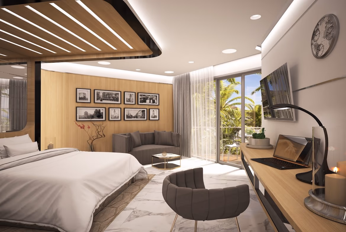 A modern, open-concept living room with a sofa, coffee table, and an ocean view through large windows.