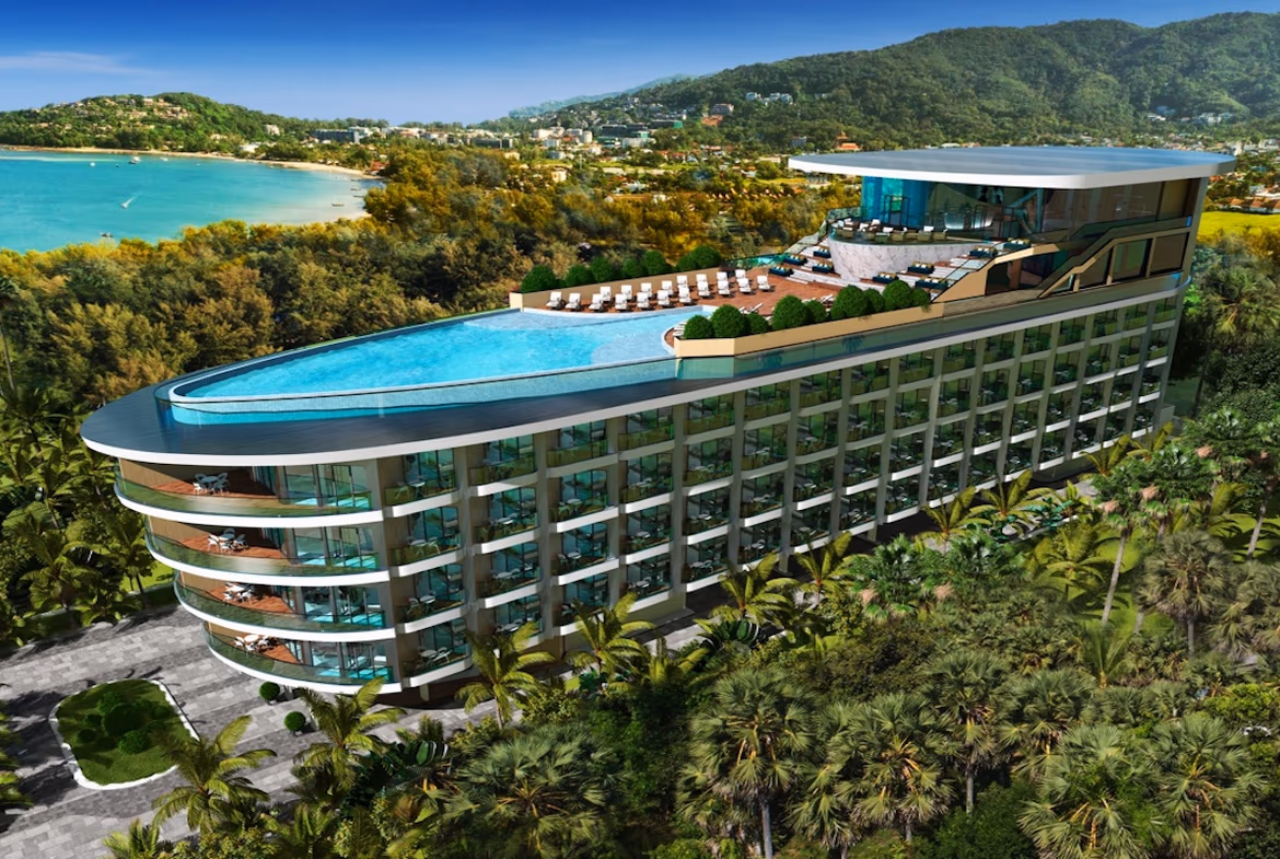 A 1-bedroom condominium in Bang Tao has an angular orange and white facade and a balcony overlooking a pool.