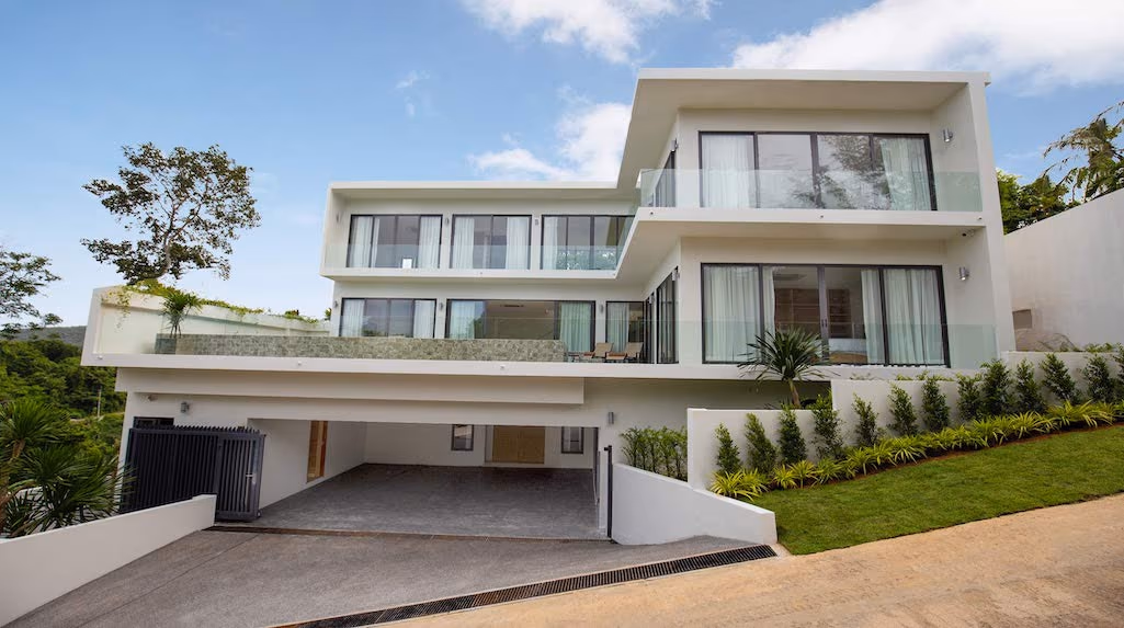 Modern 4-bedroom villa in Layan with a sea view. It features a private infinity pool overlooking the ocean.
