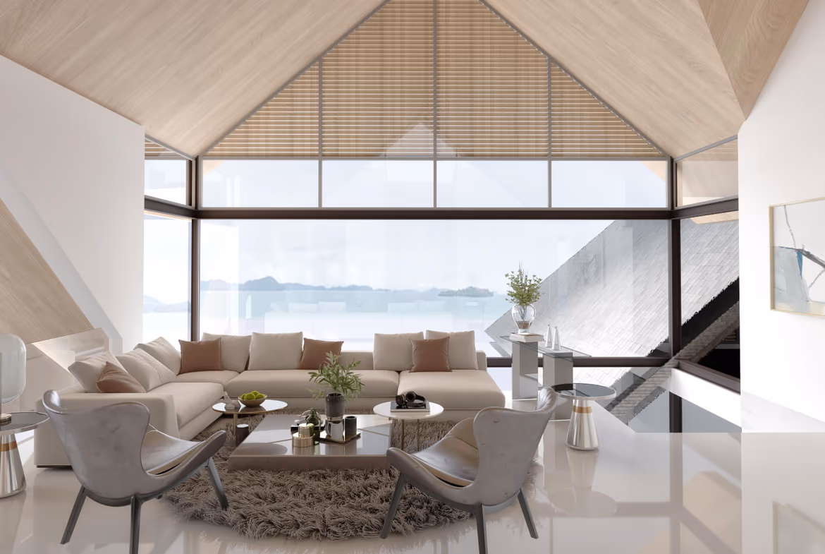 This image likely shows the interior of a spacious, modern living room with large windows overlooking a body of water.