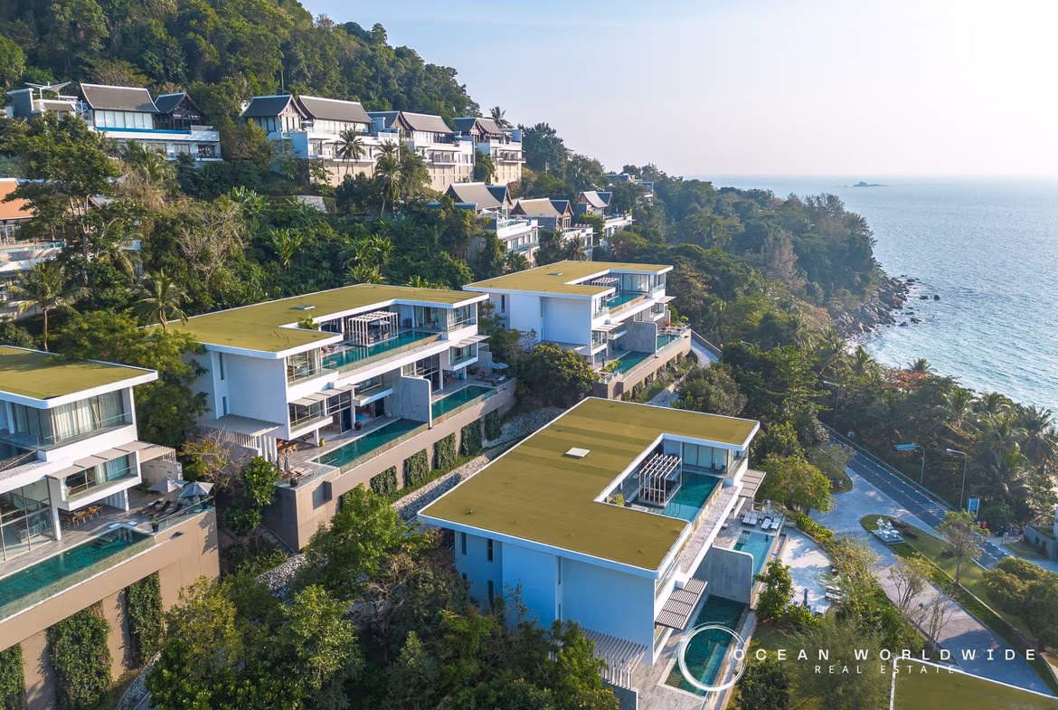A panoramic view of the ocean from a spacious balcony or terrace.