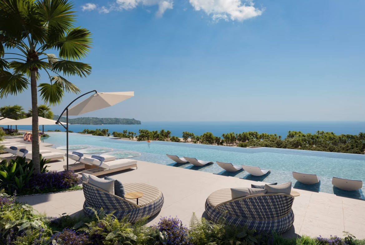 Oceanfront balcony with seating.