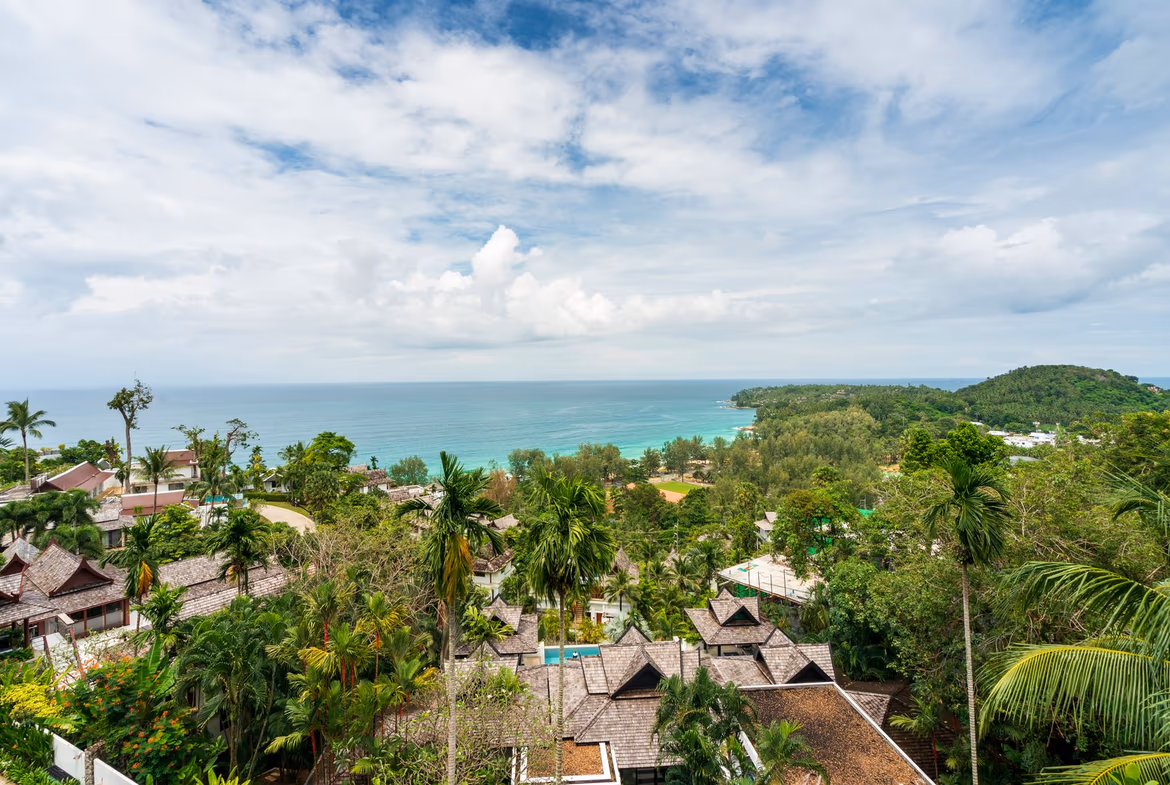 A view of an infinity pool overlooking the ocean.