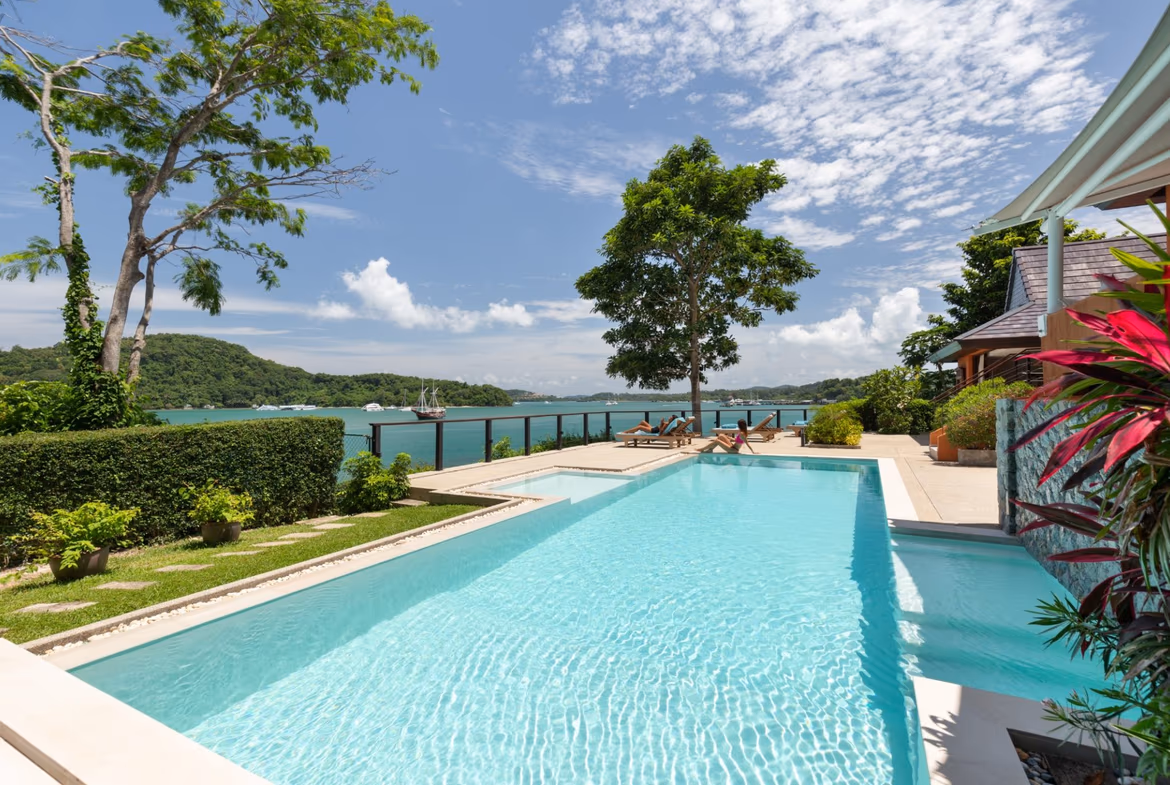 An expansive ocean view from a spacious balcony or patio.
