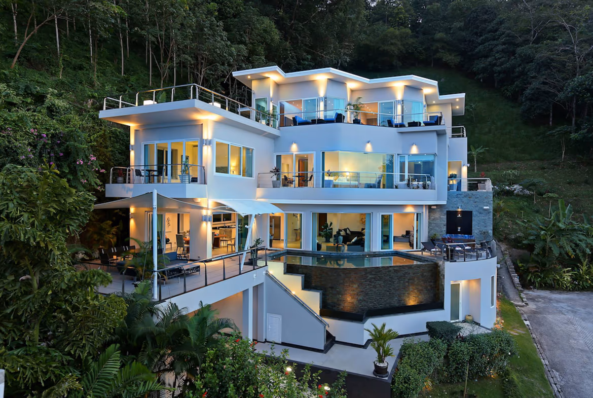 A six-bedroom modern villa in Bang Tao with a prominent ocean view.