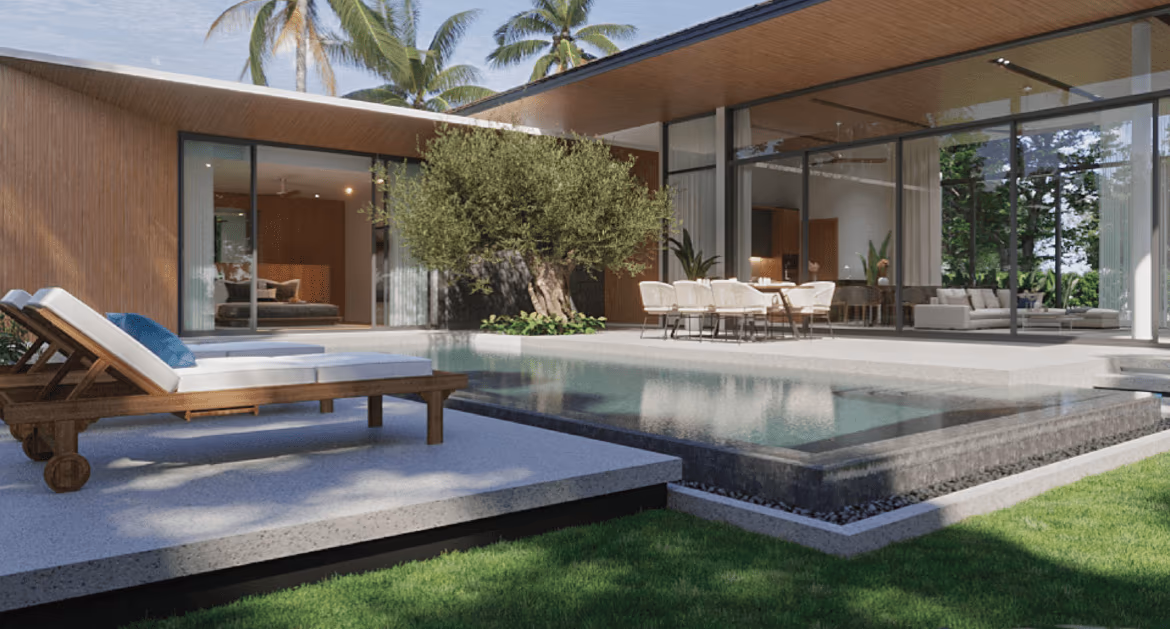 A new, modern, luxury three-bedroom villa in Bang Tao with a private pool. The spacious villa has a contemporary design and is surrounded by lush greenery.