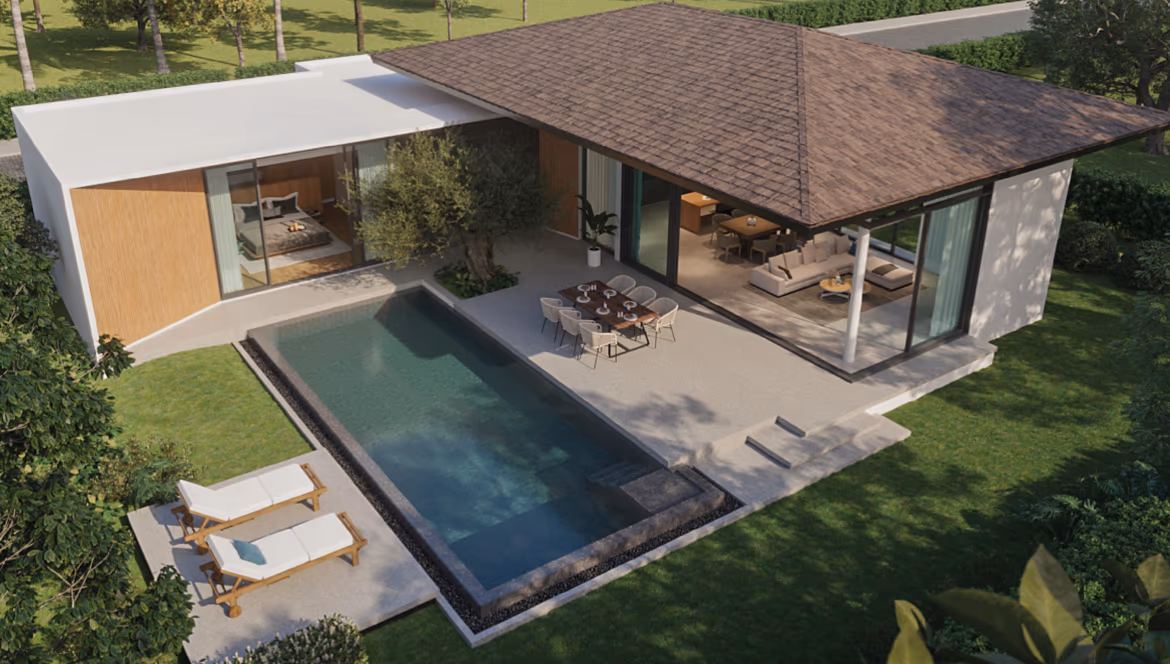 A spacious, modern living room with large windows overlooking a lush garden.