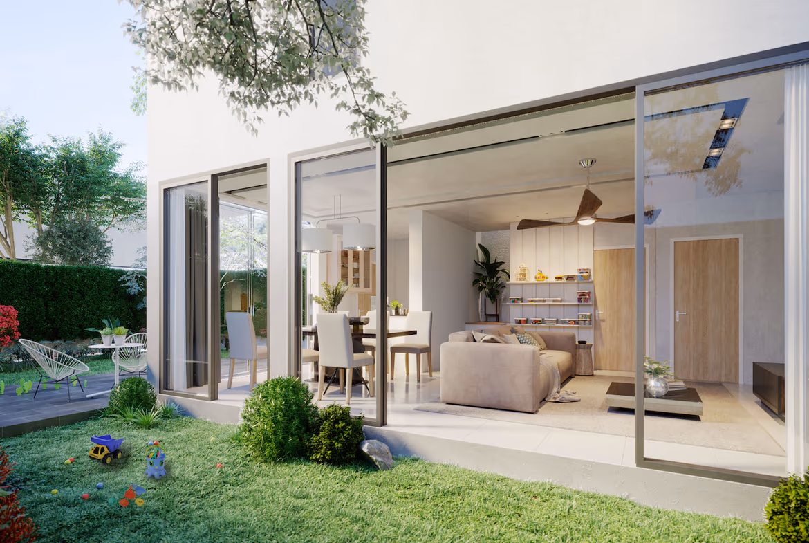 A spacious, modern living room with large sliding glass doors opening to an outdoor patio with a swimming pool.