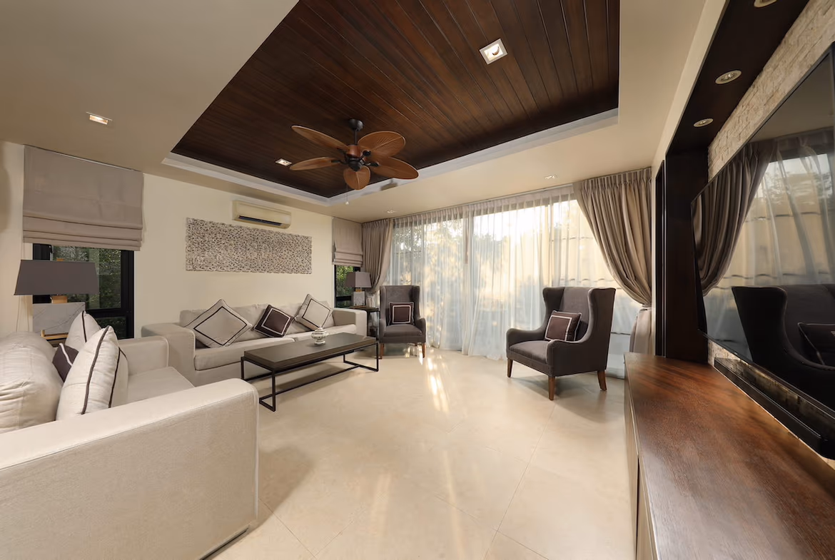 This photo likely shows the villa's modern kitchen with an island and integrated appliances.