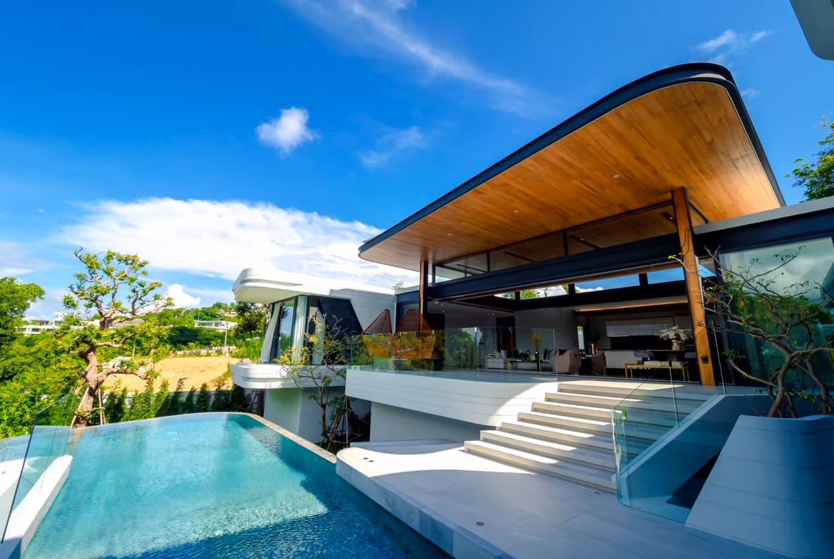 Modern villa in Cherngtalay featuring a private pool. The exterior shot highlights the contemporary architectural style.