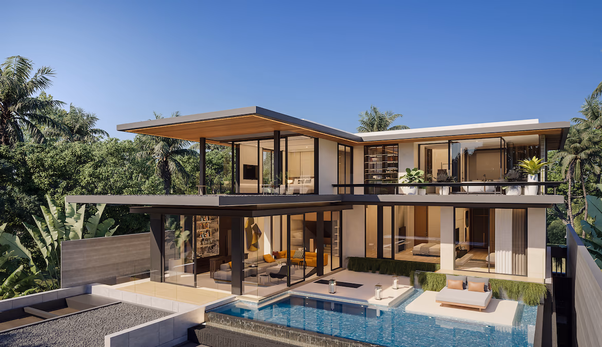 A modern, open-plan living room with light-colored furnishings and a view of the ocean.