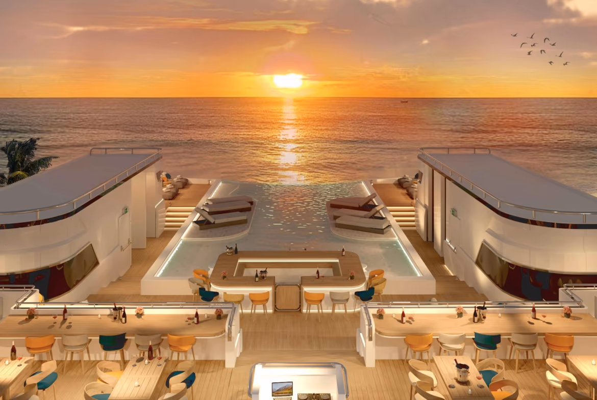 A bedroom with a view of the ocean from a private balcony.