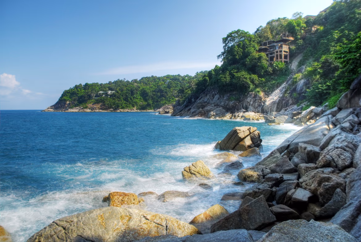 Panoramic ocean view from a hillside land plot in Kamala. The undeveloped land could be suitable for building a private residence.