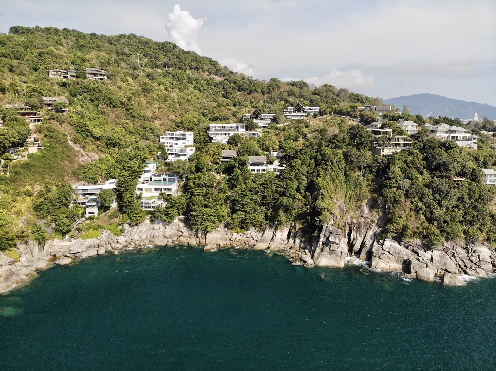 A panoramic view of the coastline and hills from a high vantage point.