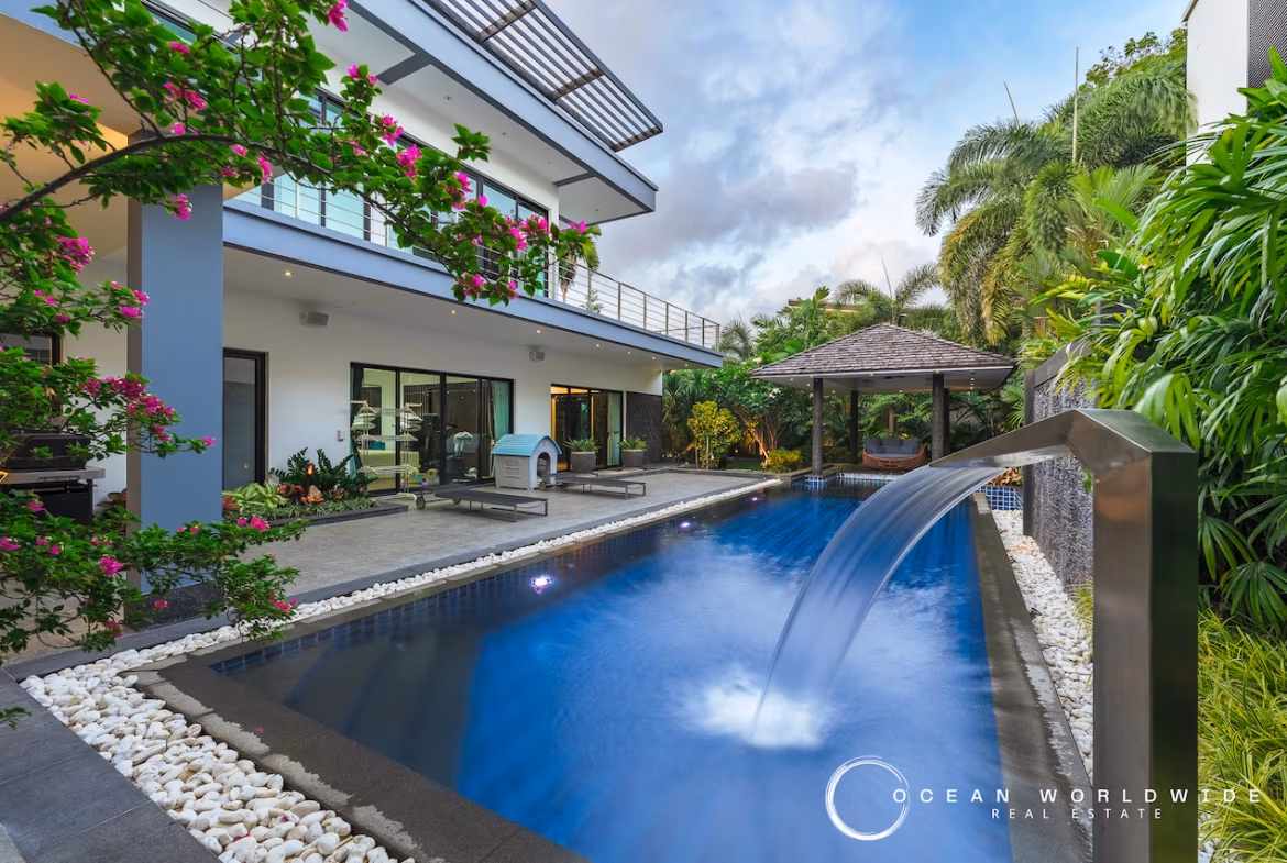 A modern four-bedroom villa in Pasak with a private pool.