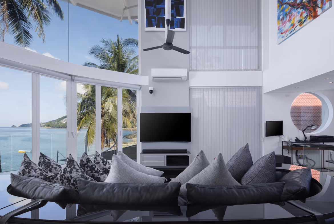 Living room with a partial ocean view.