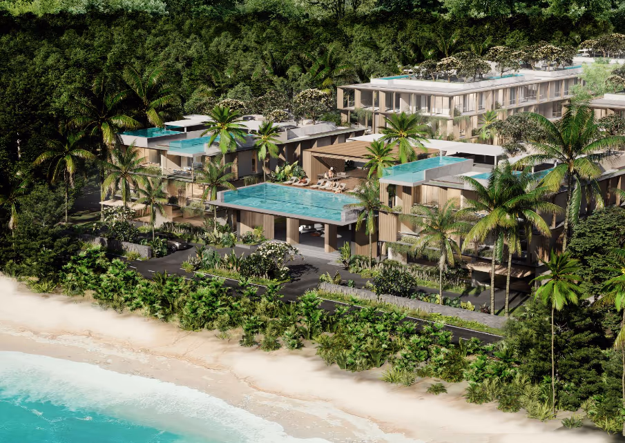 Exterior view of a beachfront villa in Layan, featuring a gated community.
