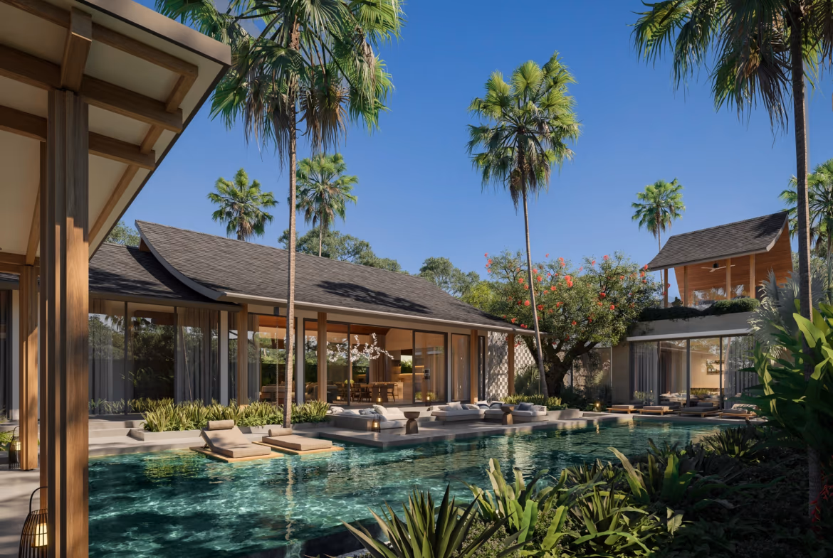 A modern open-plan living area with a sofa, coffee table, and large sliding glass doors leading to an outdoor space.