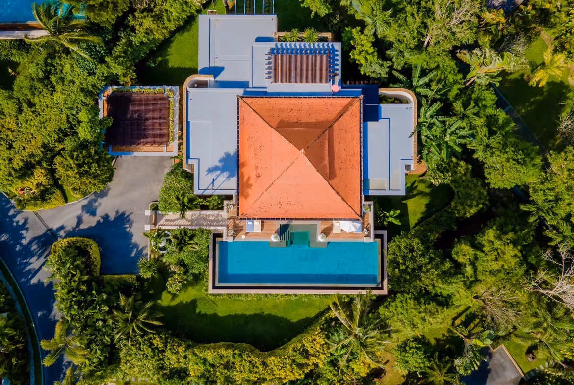 A panoramic ocean view from a spacious balcony or terrace.