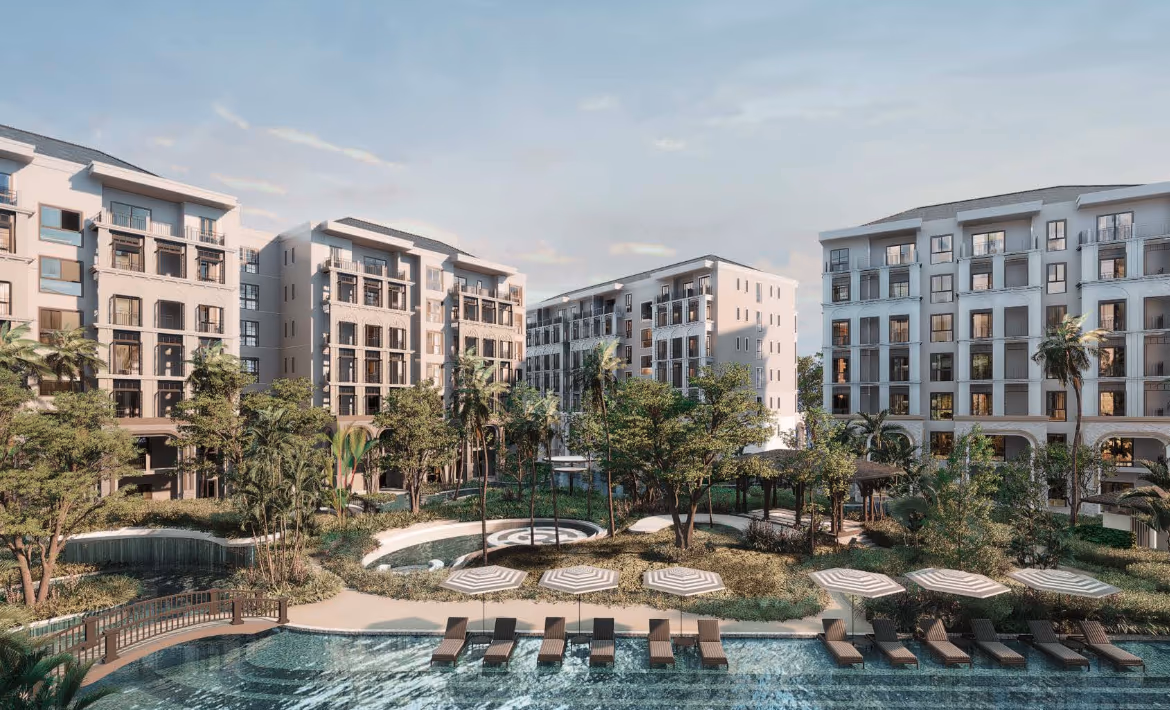 A modern one-bedroom apartment in a gated Bang Tao community, featuring a sleek facade and balconies.
