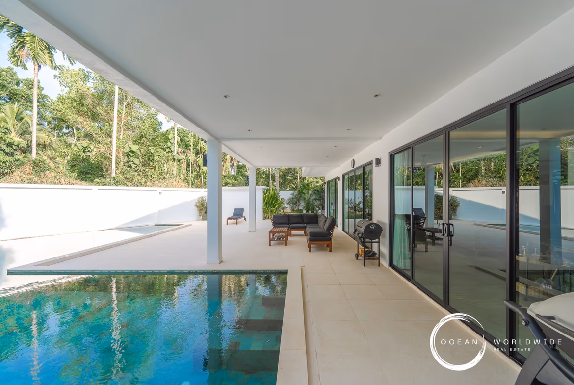 This photo likely shows the private swimming pool and a lounging area, possibly with a view of the surrounding landscape.