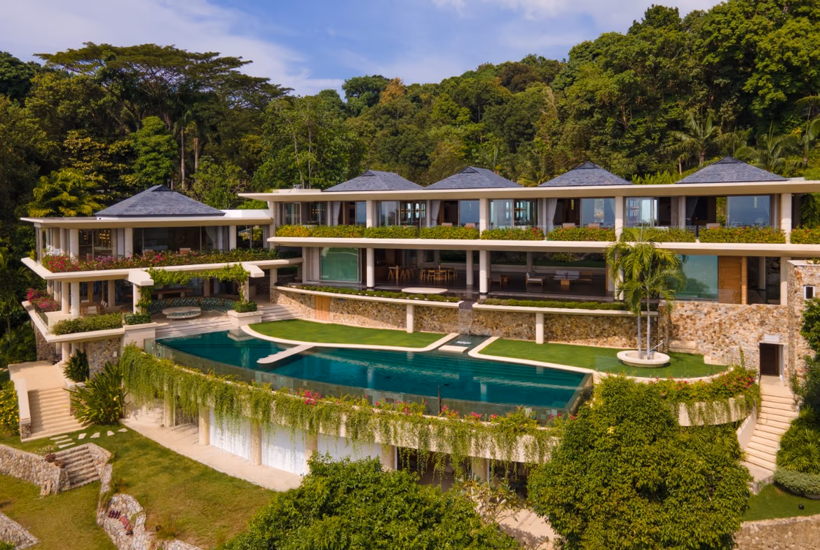 A large, luxurious, multi-story villa in Kamala with a private swimming pool overlooking the ocean.