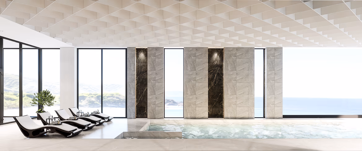 A modern bathroom with a glass-enclosed shower and a large mirror.