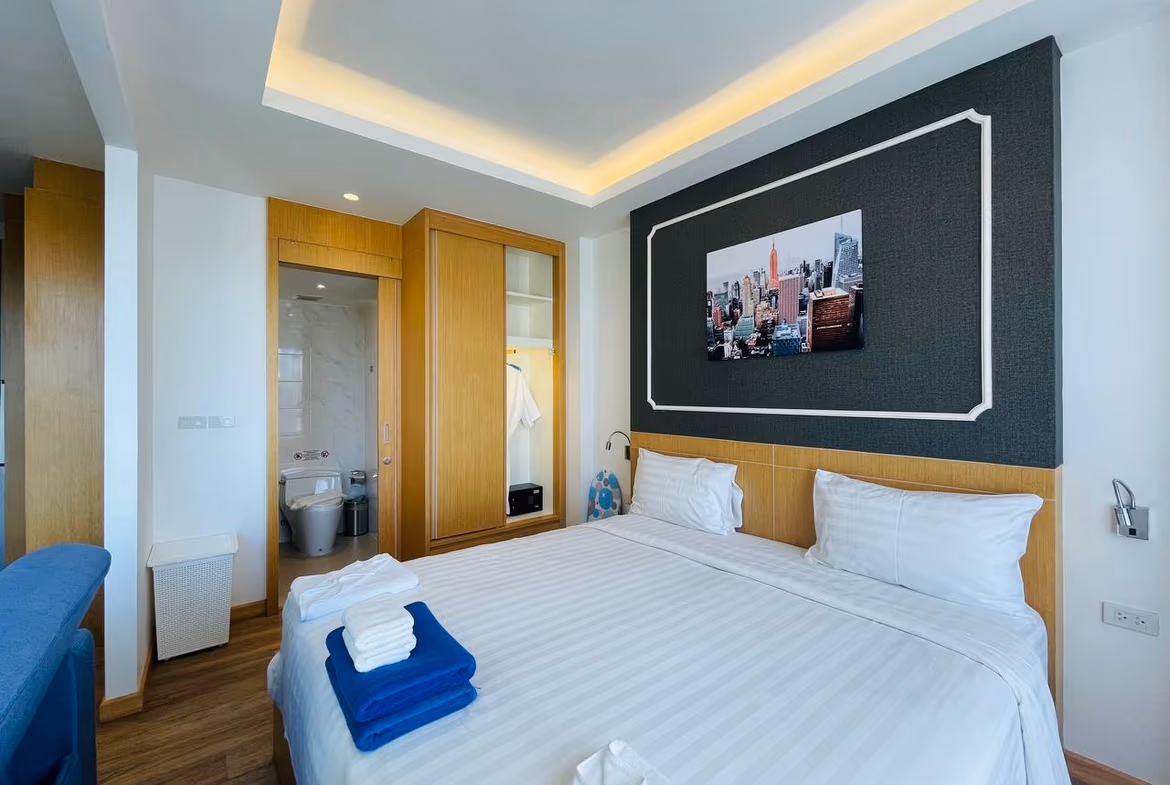 A studio apartment with a modern bathroom.