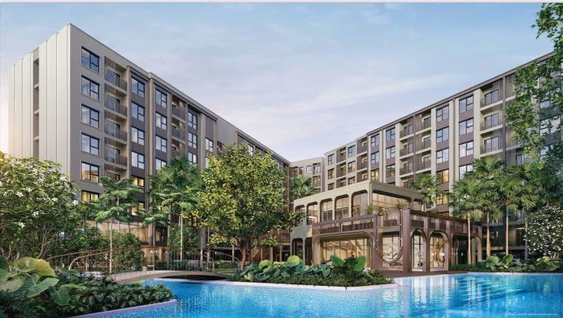 Condominium in Phuket featuring a private pool. The low-rise building has a modern facade with balconies.