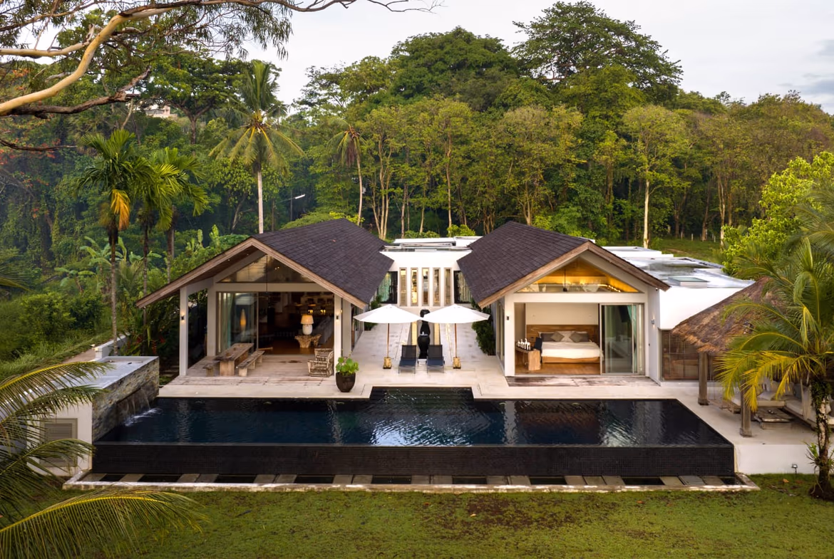 A 5-bedroom waterfront villa in Cape Yamu features a private pool with views of the ocean.