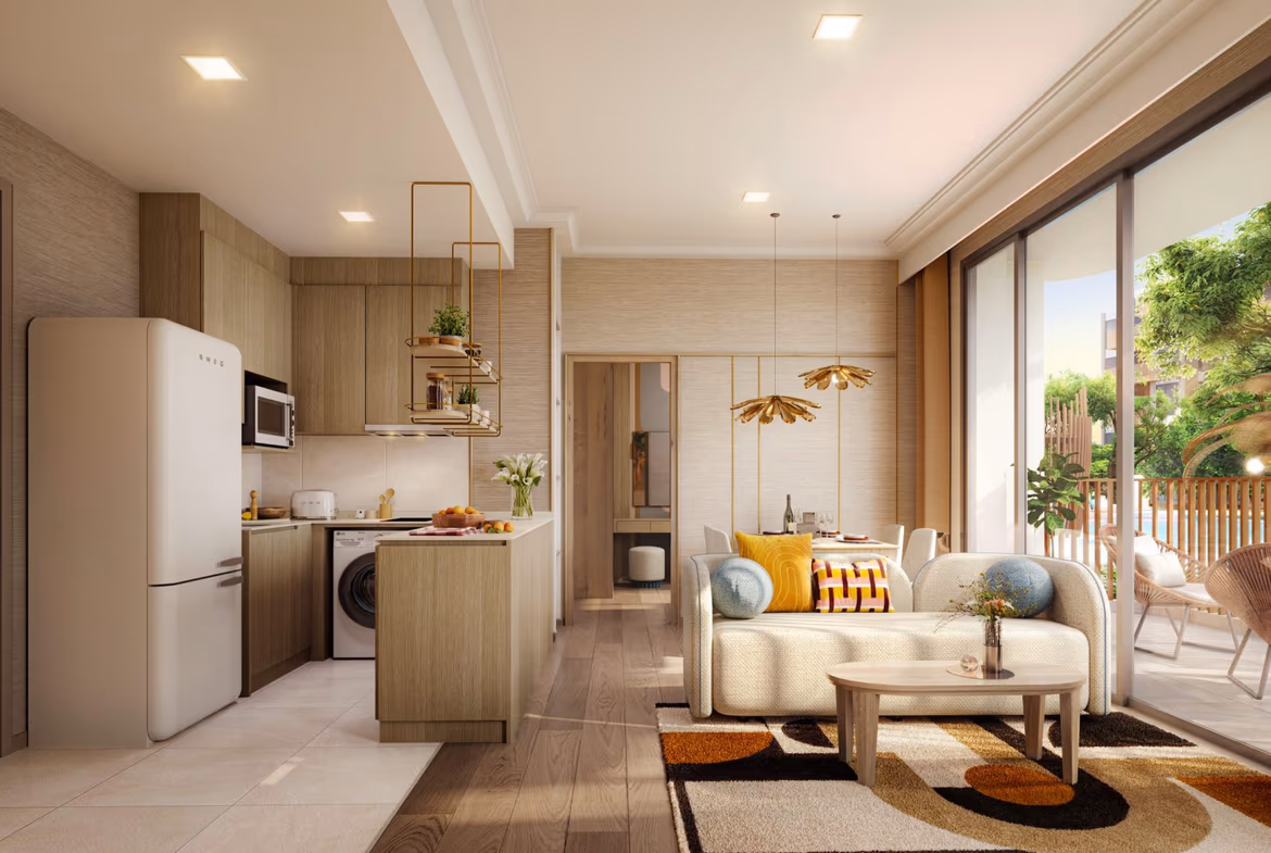 A spacious living area with minimalist decor and a large sliding glass door opening to a private balcony.