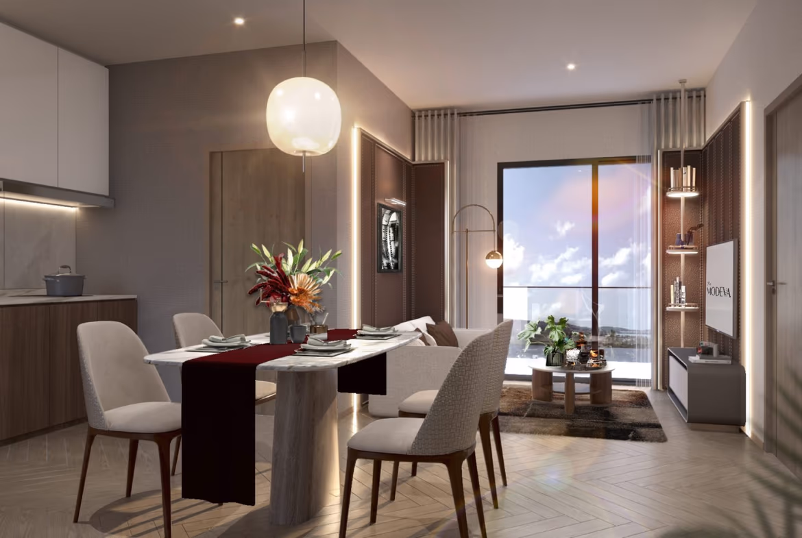 A modern, open-concept living room with light-colored furnishings and a large window overlooking a city or resort landscape.