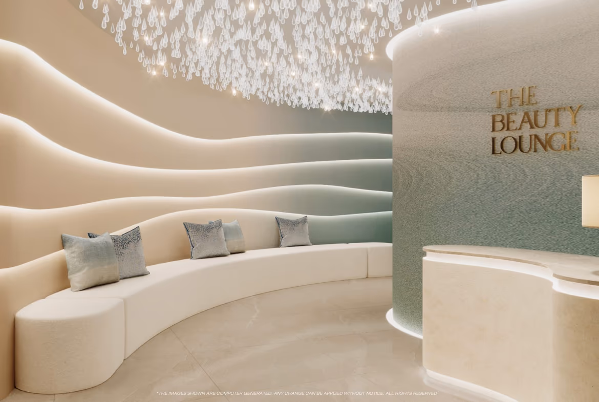 A spacious living area with modern furnishings and a view of the ocean.