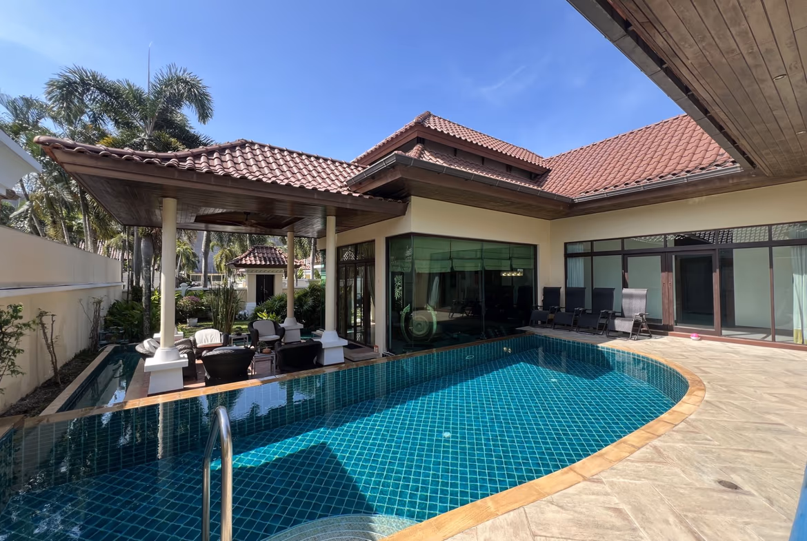 This three-bedroom villa in Phuket features a private pool, set within a spacious garden.