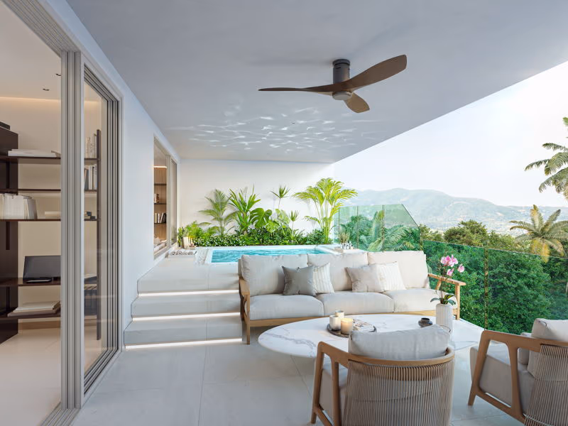 A one-bedroom condominium in Phuket, Thailand, featuring a private pool and an exterior blending modern and tropical architecture.