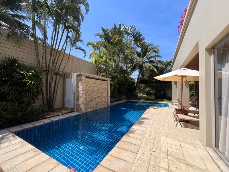 Three-bedroom villa in a gated community in Phuket, with a private garden visible from the exterior.