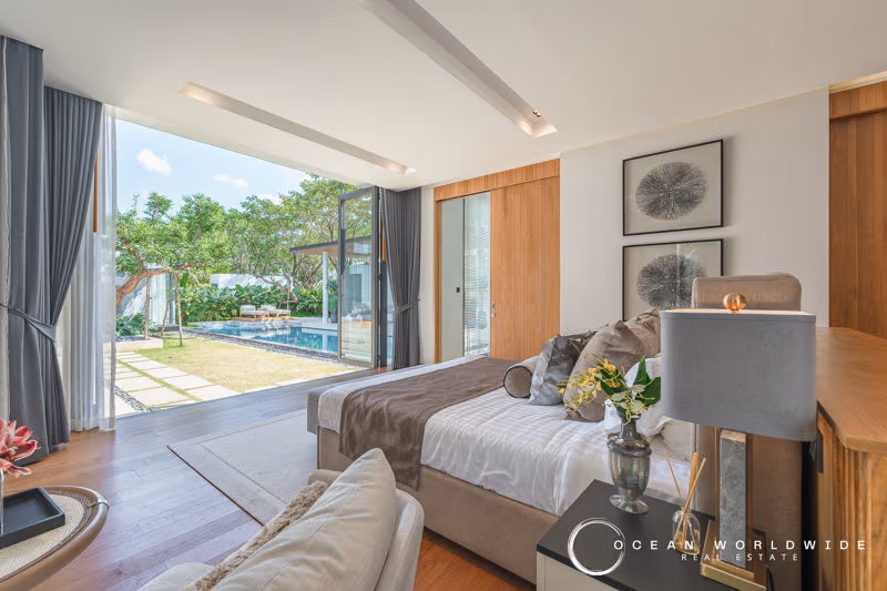 Modern 3-bedroom villa in Phuket featuring a private pool. The spacious residence boasts contemporary architecture.