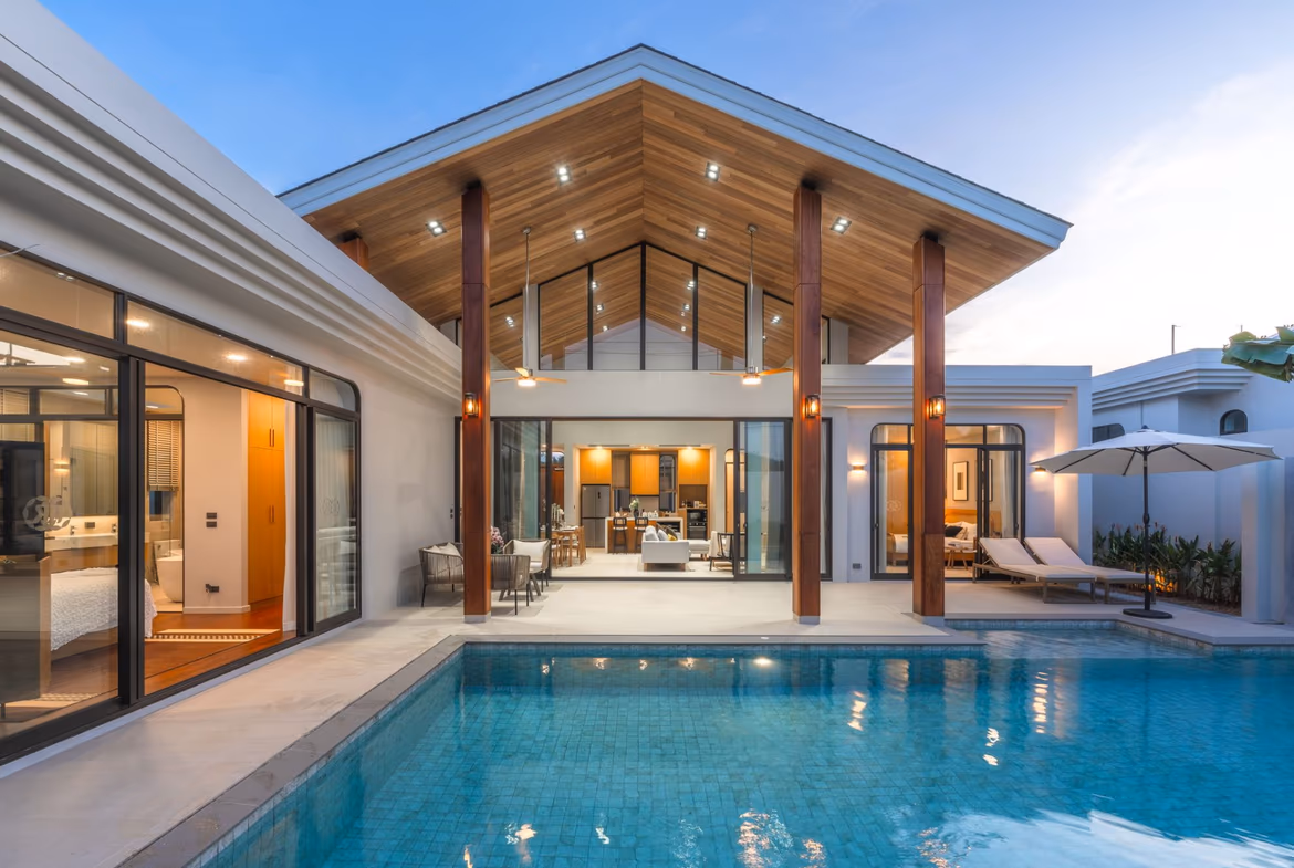 This is an exterior shot of a three-bedroom penthouse in Phuket, featuring a private pool.