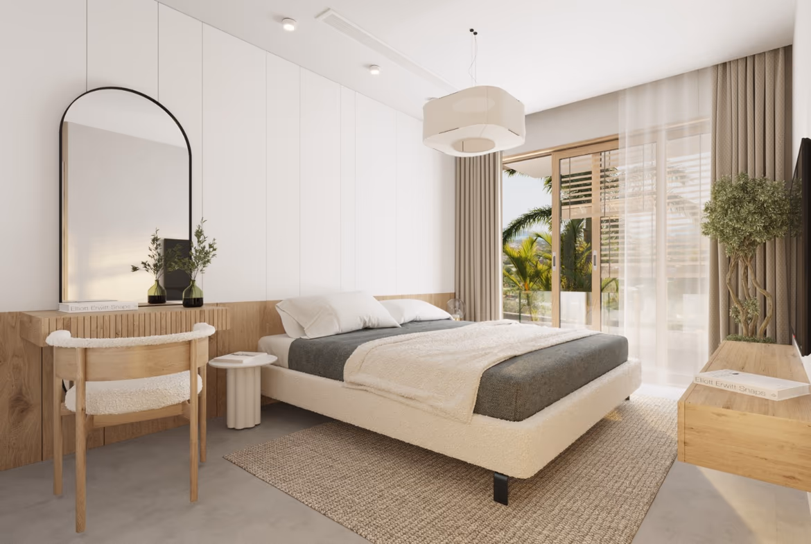 A spacious living area with modern furnishings and a view of the garden.