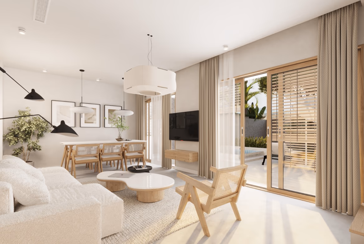 A contemporary bedroom with a large bed, dark wood furniture, and a private balcony overlooking tropical foliage.