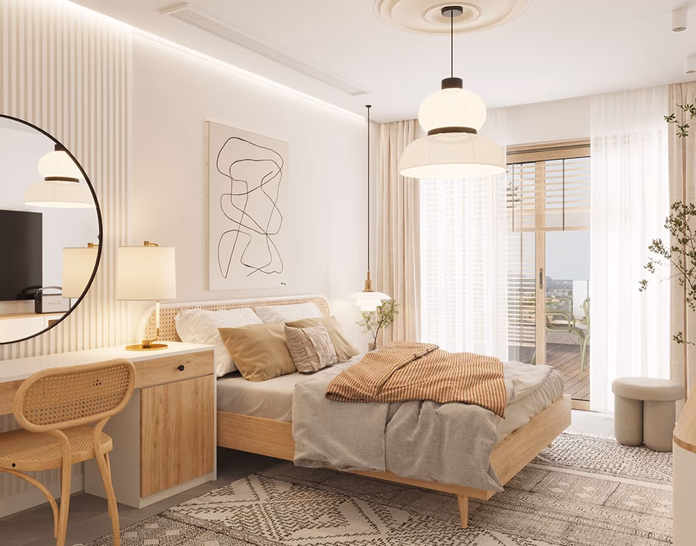 A bedroom with a large bed and bedside tables, opening to a private balcony with outdoor seating.