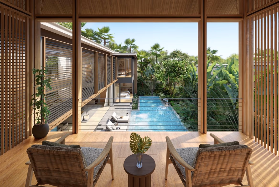 A bedroom with large sliding glass doors opens to an outdoor patio with a swimming pool.