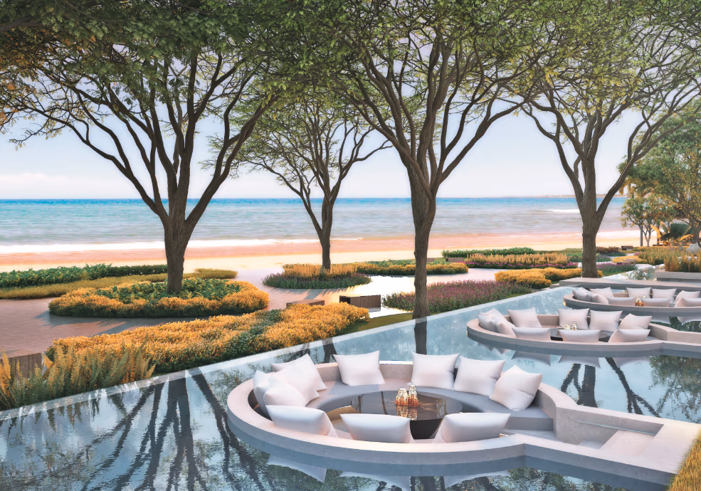 This photo likely shows a spacious living room with modern furnishings and a view of the ocean.