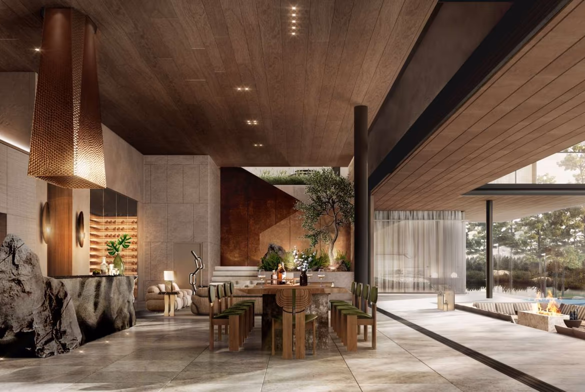 A modern bedroom with a large window and sliding glass door overlooks a lush jungle and distant mountains.