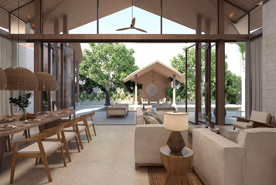 A white, two-story villa with a blue-tiled swimming pool and palm trees in Pasak. The 4-bedroom luxury property has a modern architectural style.