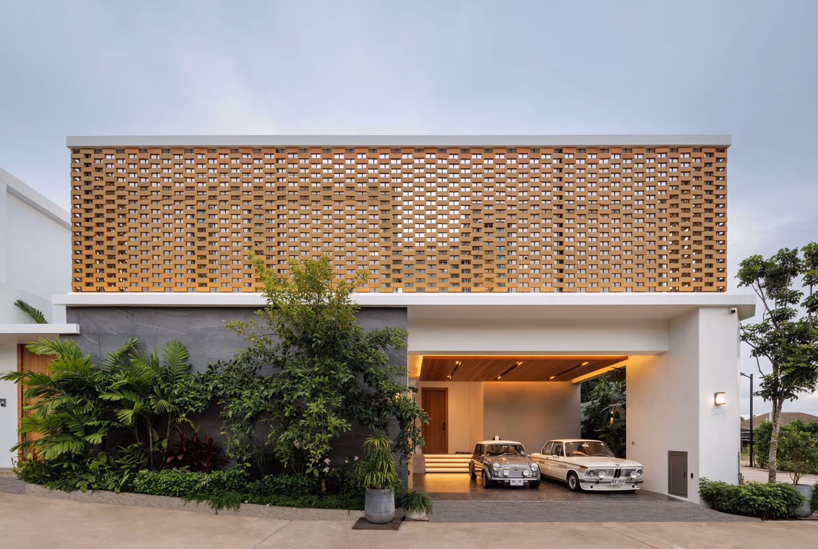 A modern, four-bedroom villa in Pasak with a private pool. The spacious residence features clean lines and large windows.