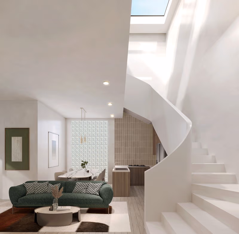 A bright, modern living room with a large sofa facing a flat-screen TV.