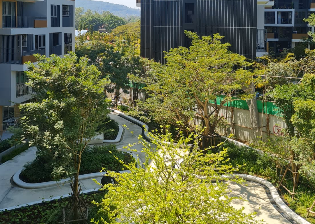 A one-bedroom condominium in Cherngtalay's Laguna gated community, viewed from the exterior. The property features a garden view.