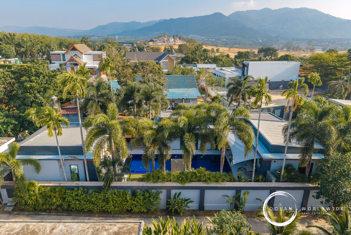 The photo likely shows a private swimming pool on an outdoor patio within the villa.